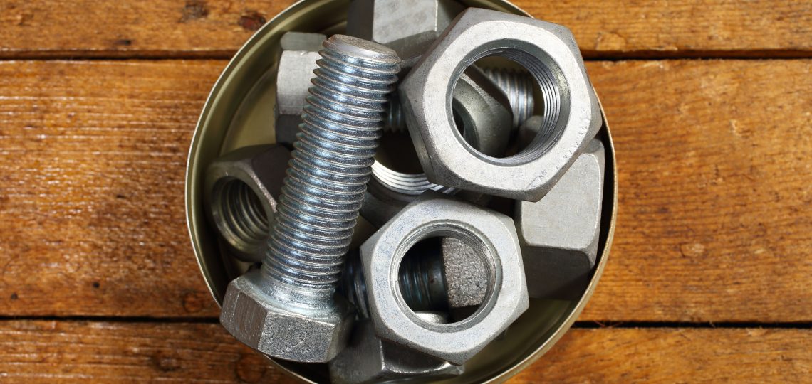 screws and bolts in a container