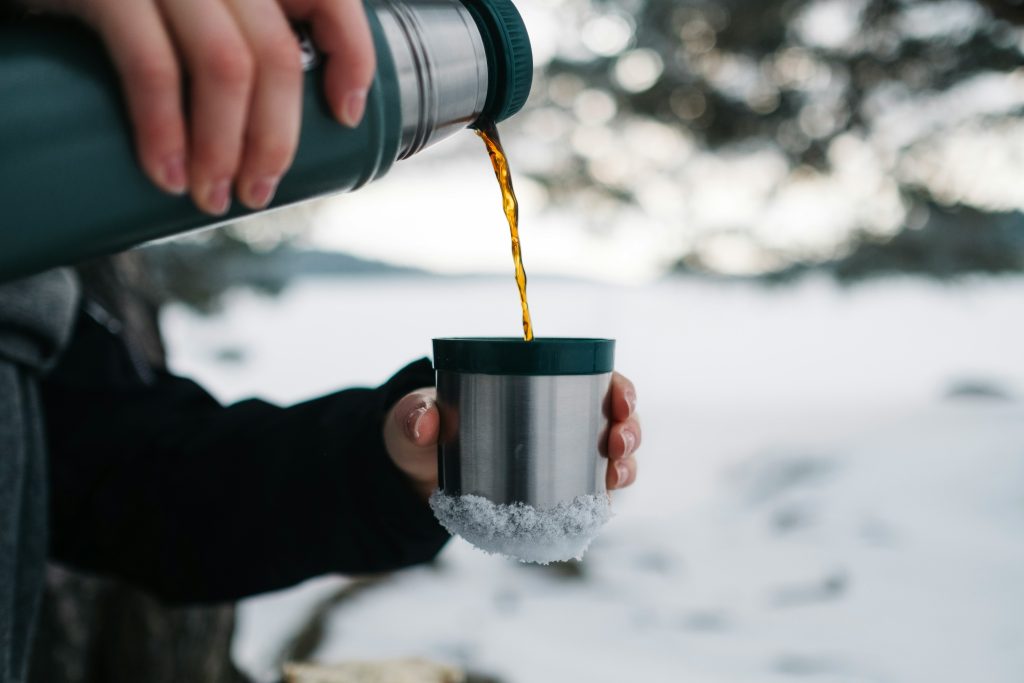 Thermos pouring coffee 