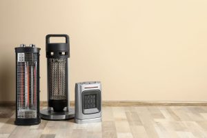 space heaters placed at a corner